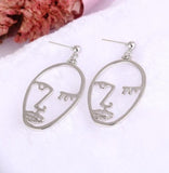 human face earrings